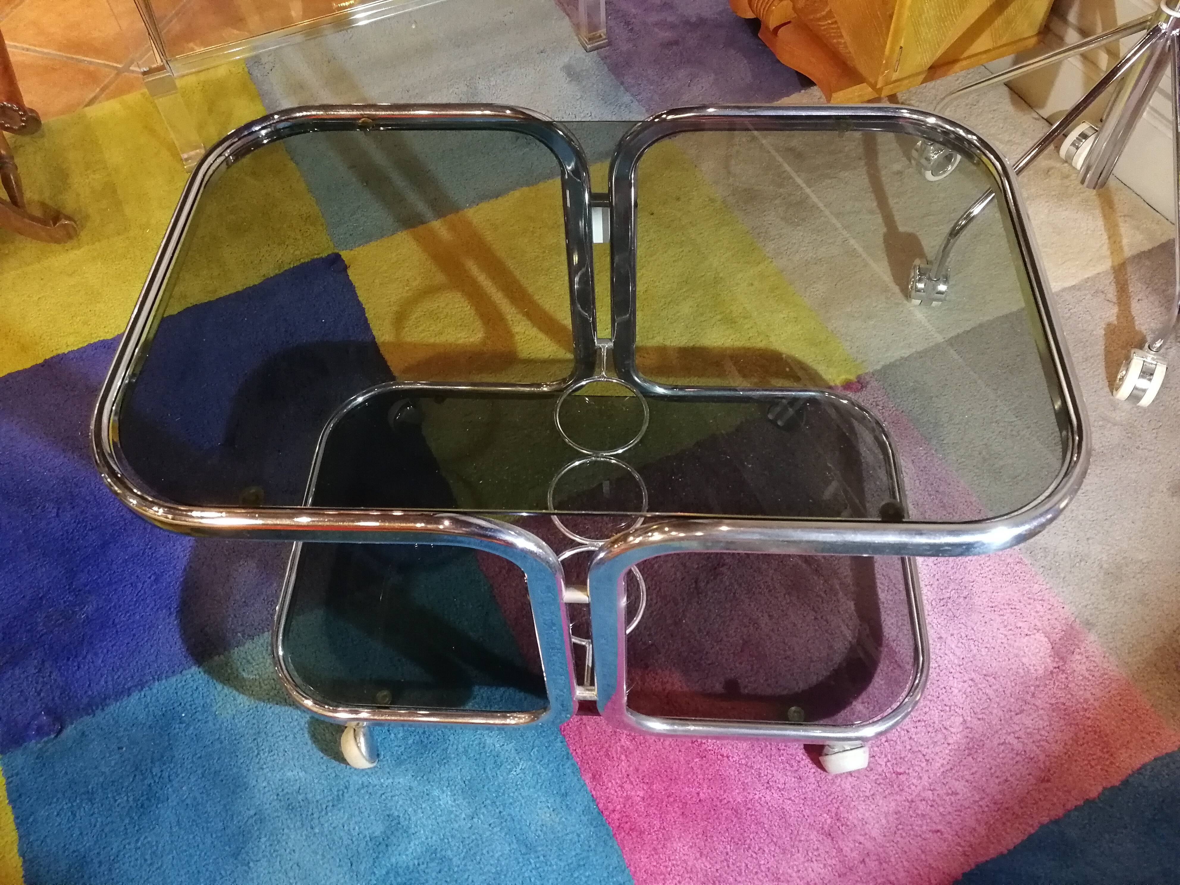 Table basse desserte chromé et verre fumé avec support à bouteille