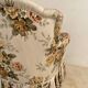 Napoleon III floral toad sofa with boudoir spirit and sliced backrest.