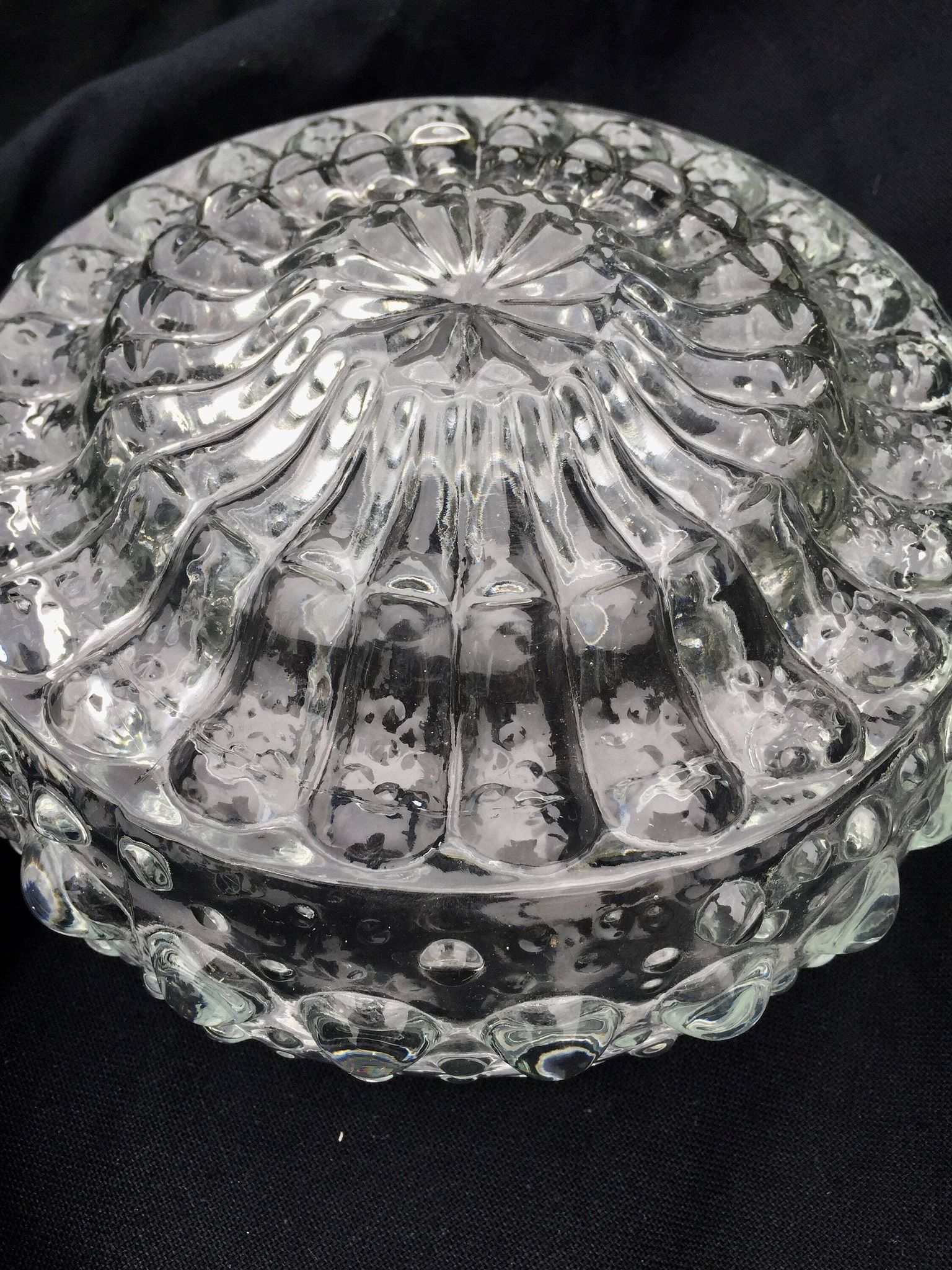 Round ceiling light or wall light in molded glass