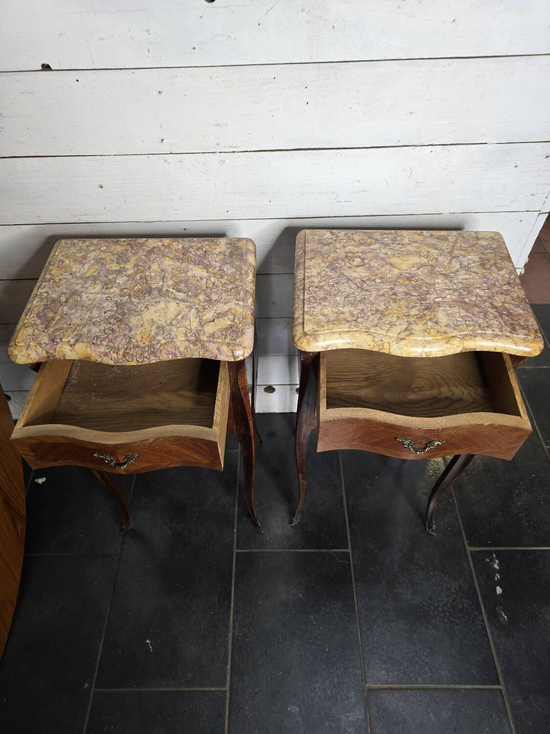 Pair of Louis XV style curved bedside tables in marquetry