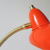 Orange flexible desk lamp