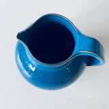 Old pitcher in glazed stoneware