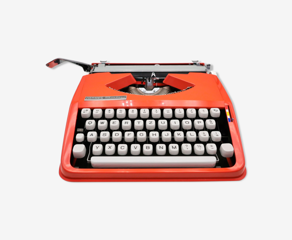 Machine à écrire rouge corail Hermes Baby révisée ruban neuf