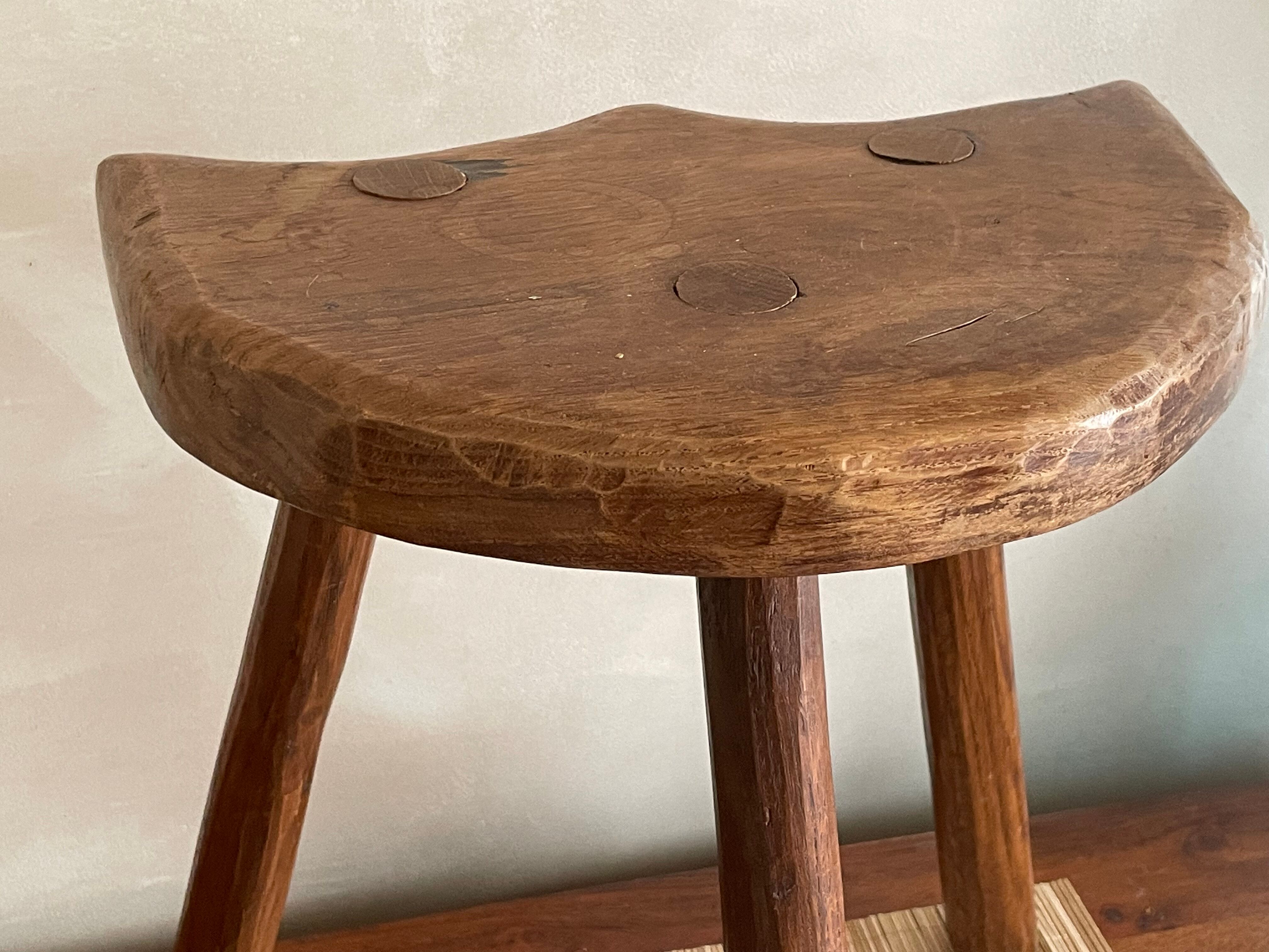 Wooden tripod stool