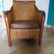 Woven rattan armchair and exotic wood in colonial style, 1980s.