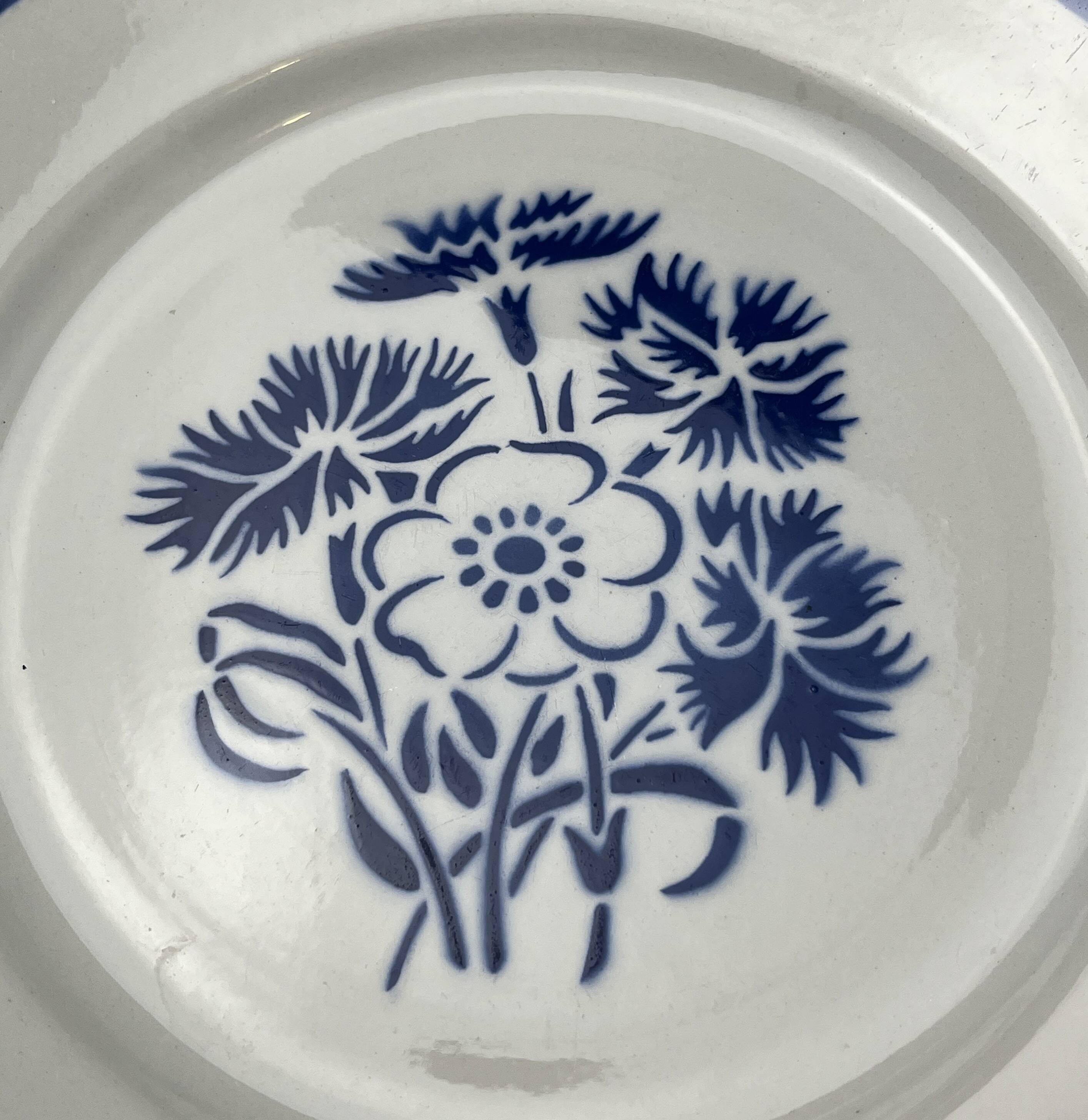 Set of four Lunéville KG plates model Annecy from around 1930.