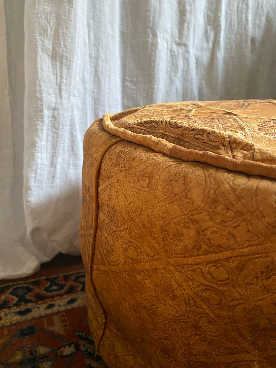 Pair of leather poufs