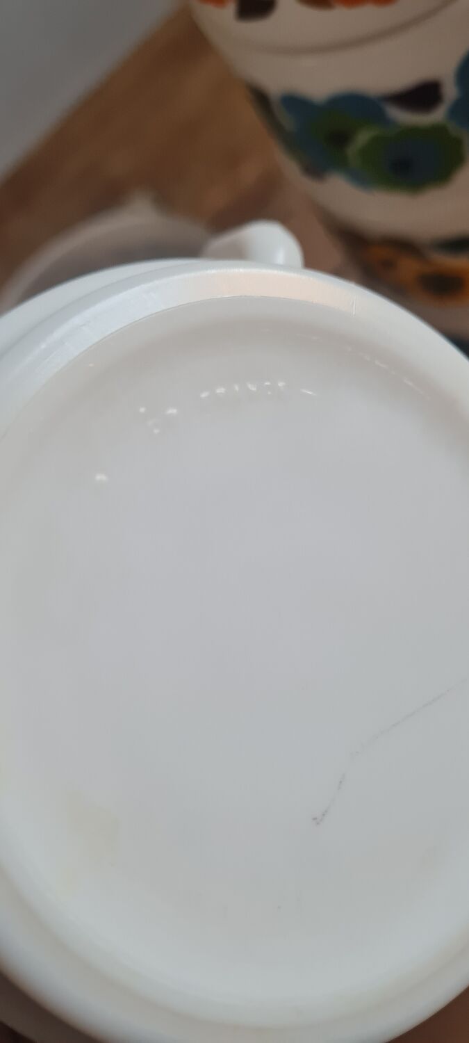 Set of seven arcopal coffee cups