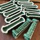 12 green ceramic knife holders