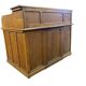 Vintage American desk made of solid wood with a curtain.