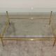 Coffee table glass and gold metal 80s