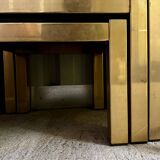 Trio of nesting tables, brass structures and smoked mirror tops