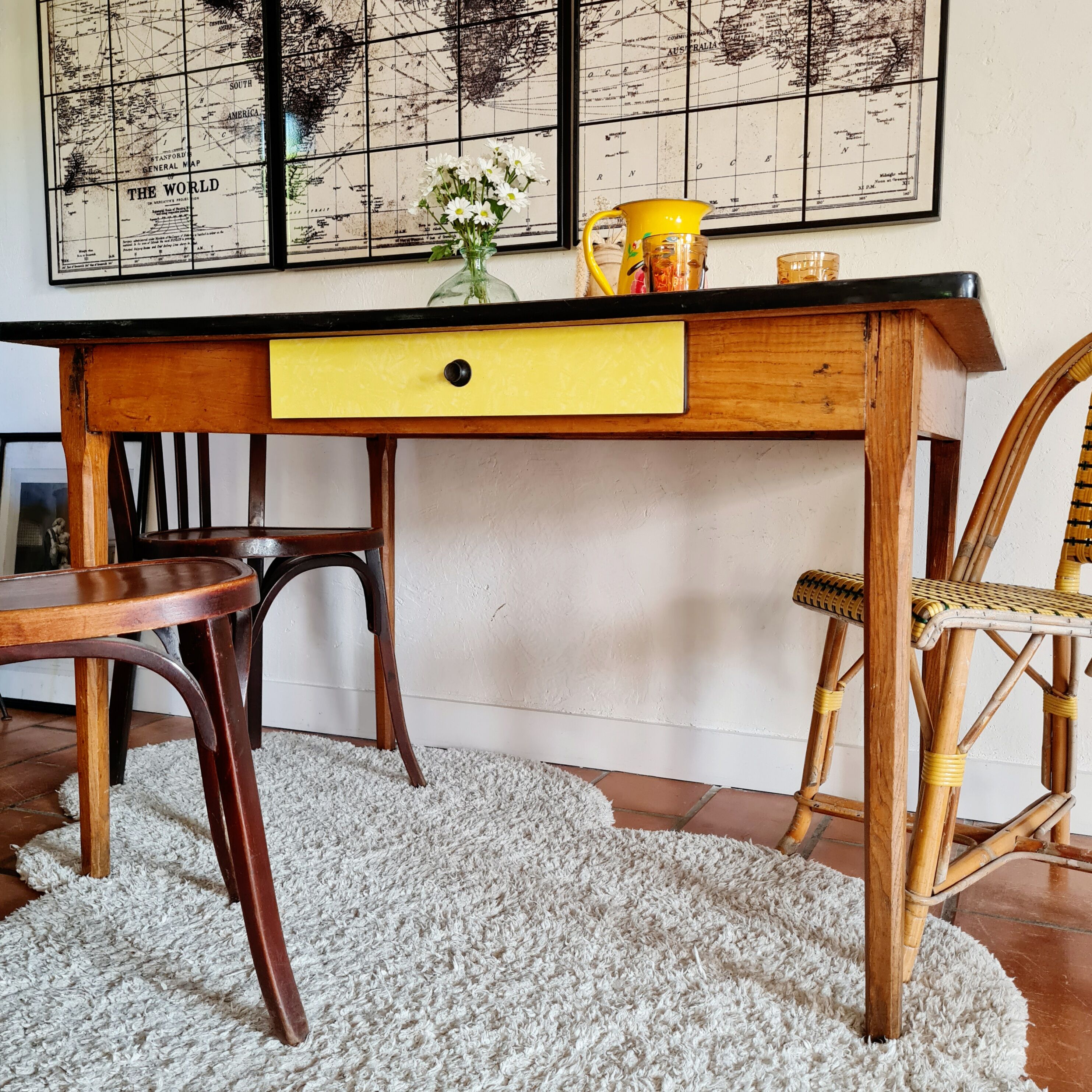 Old wooden farmhouse table and yellow formica top