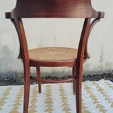 Caned chair with armrests attributed to Fischel