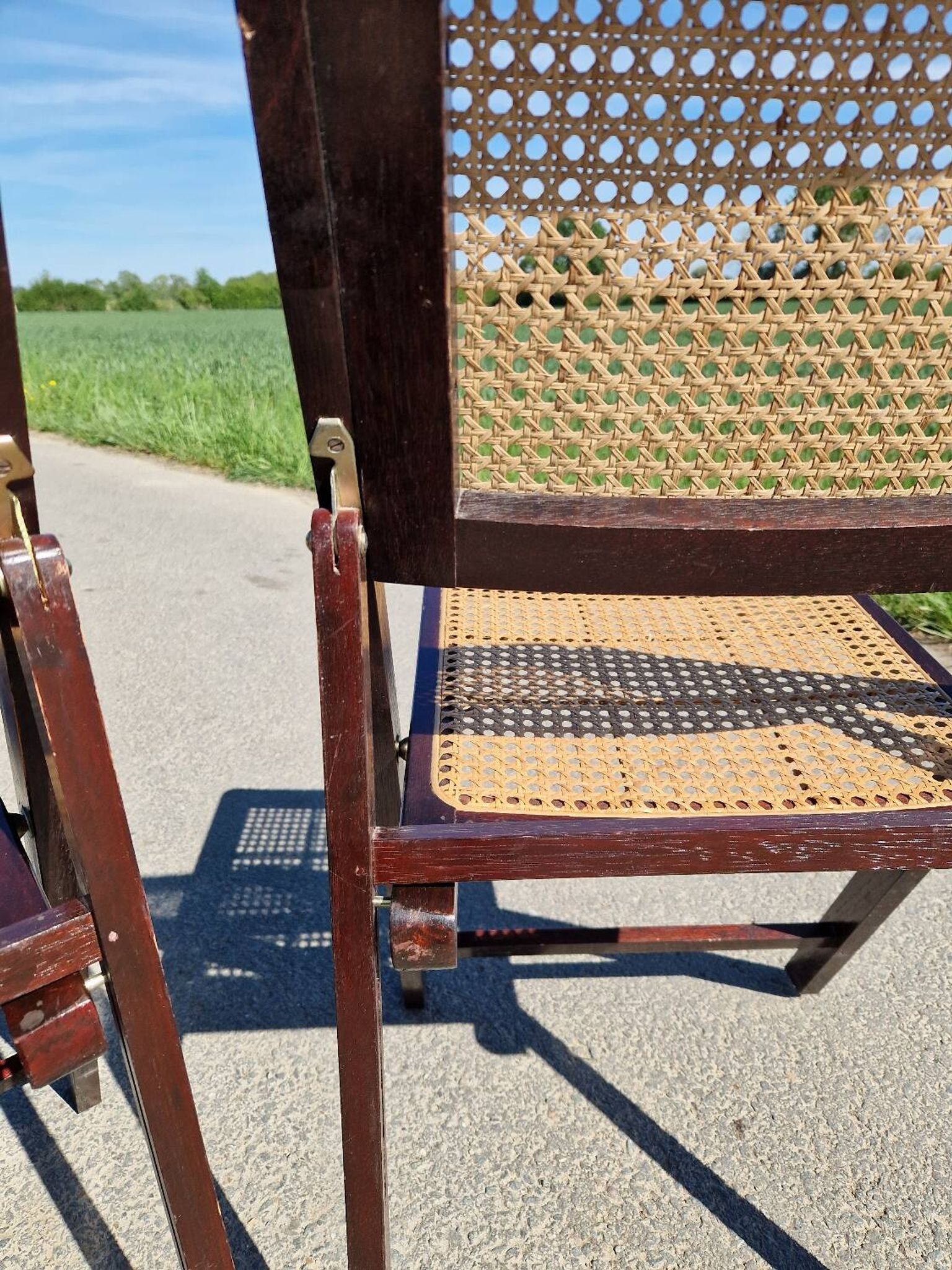 Lot de 2 chaises pliantes en bois et cannage