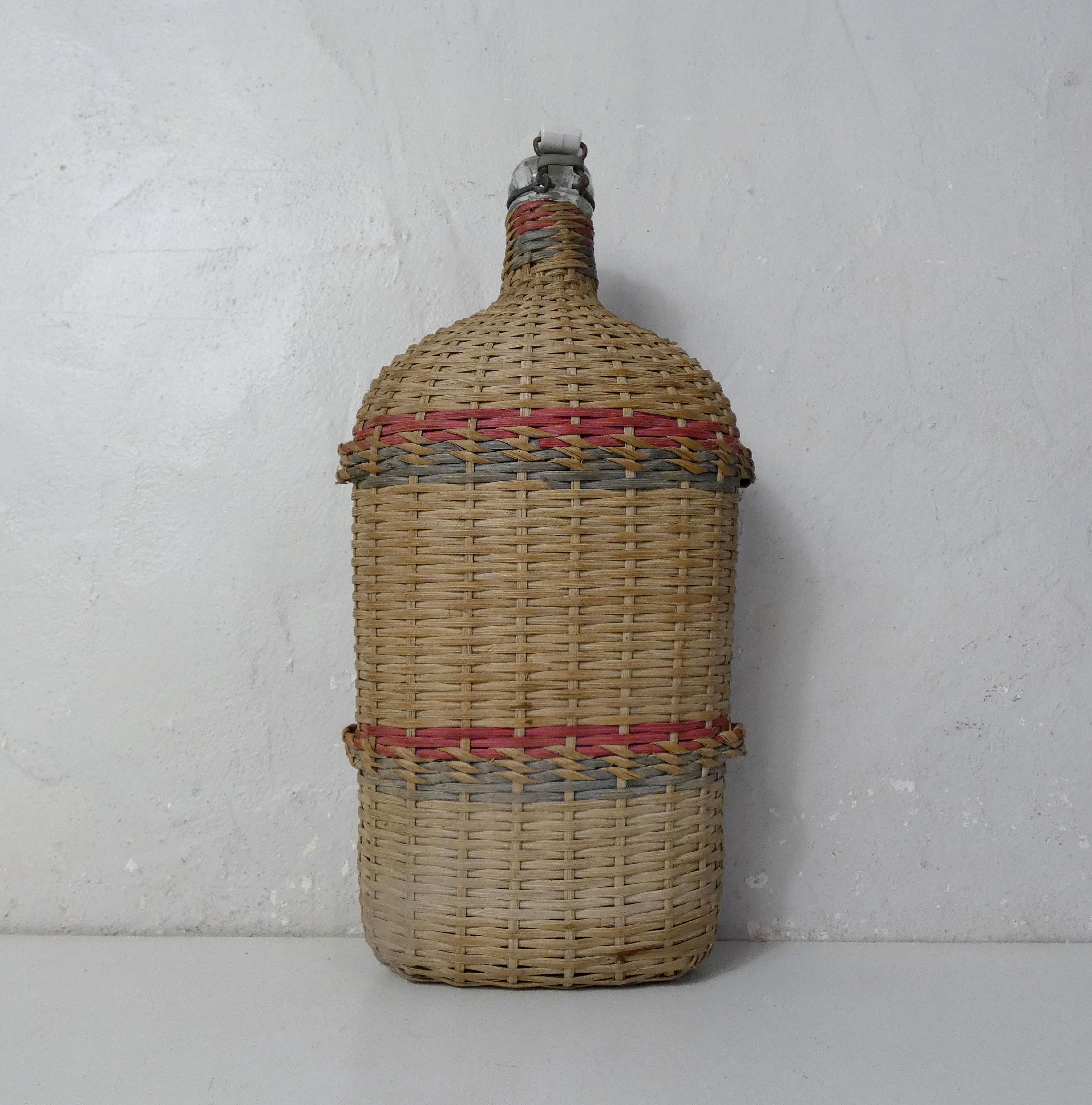 Ancient pilgrim's gourd in rattan lourdes