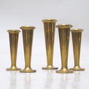 Five scandinavian brass candle holders 60s