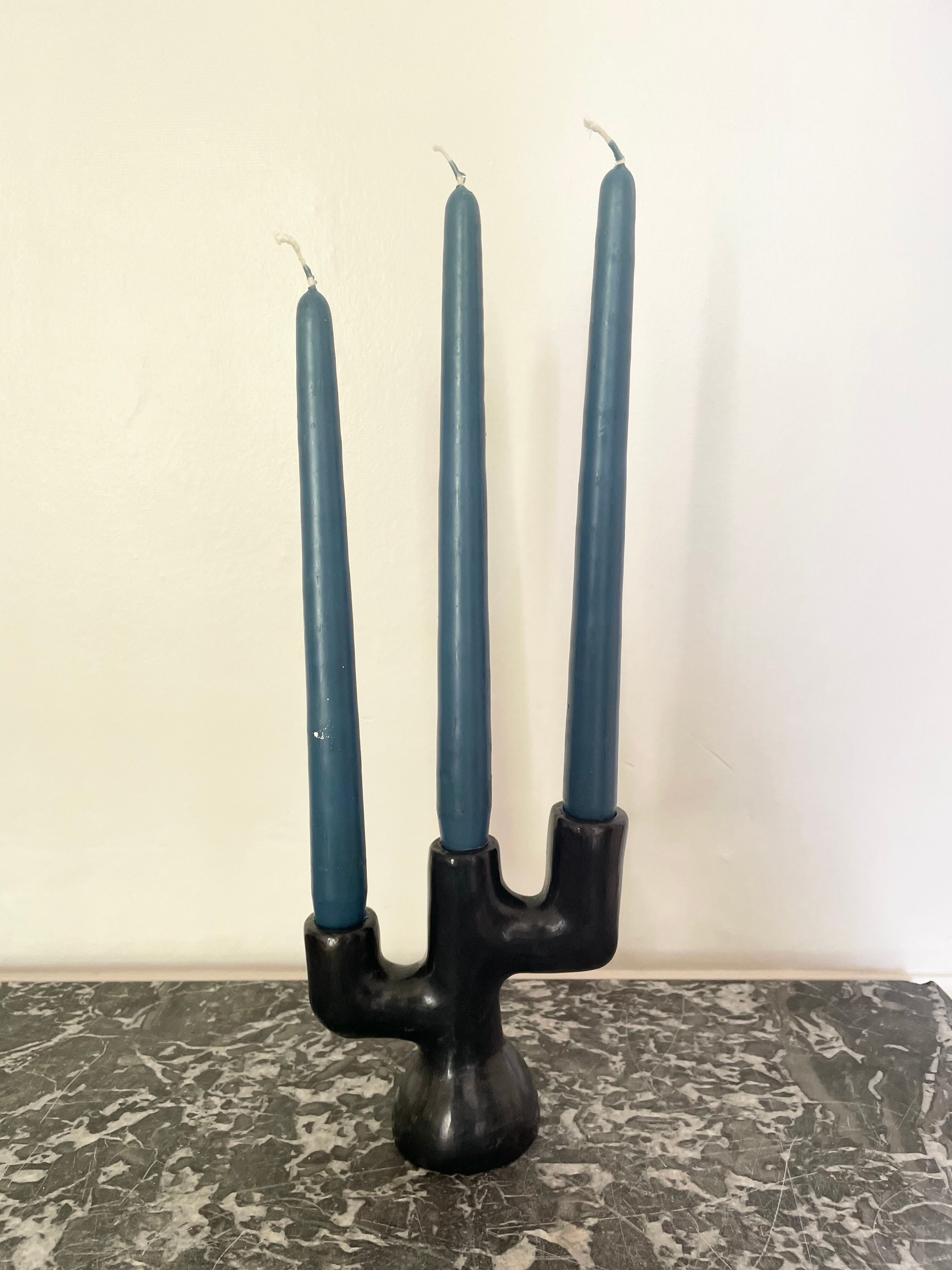 Black clay candle holder