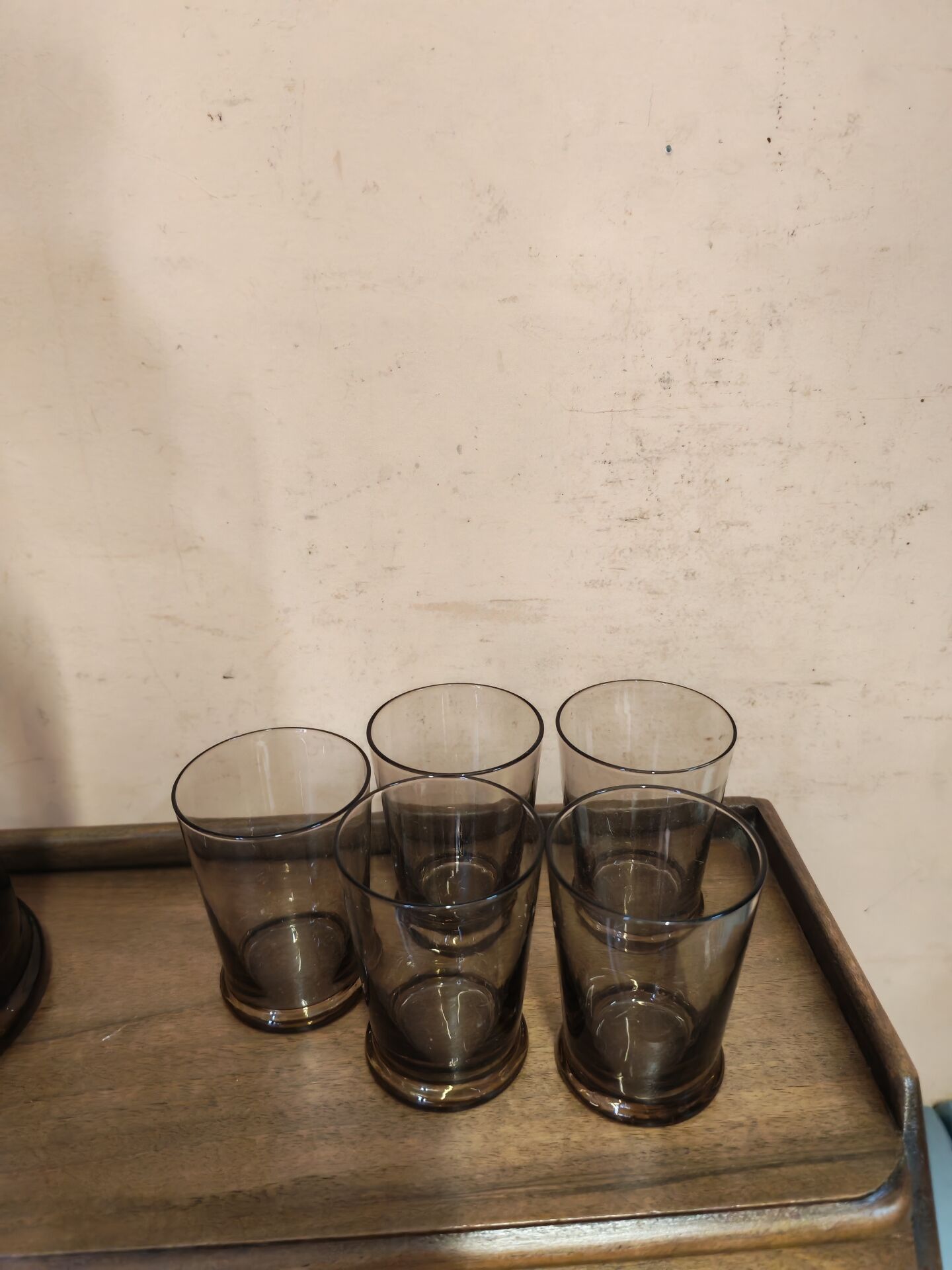 Table service set with a carafe, bottle, and 5 glass cups.