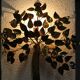 Metal tree-shaped wall applied