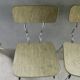 Pair of chairs in "wood" formica and gold edges, 1960s