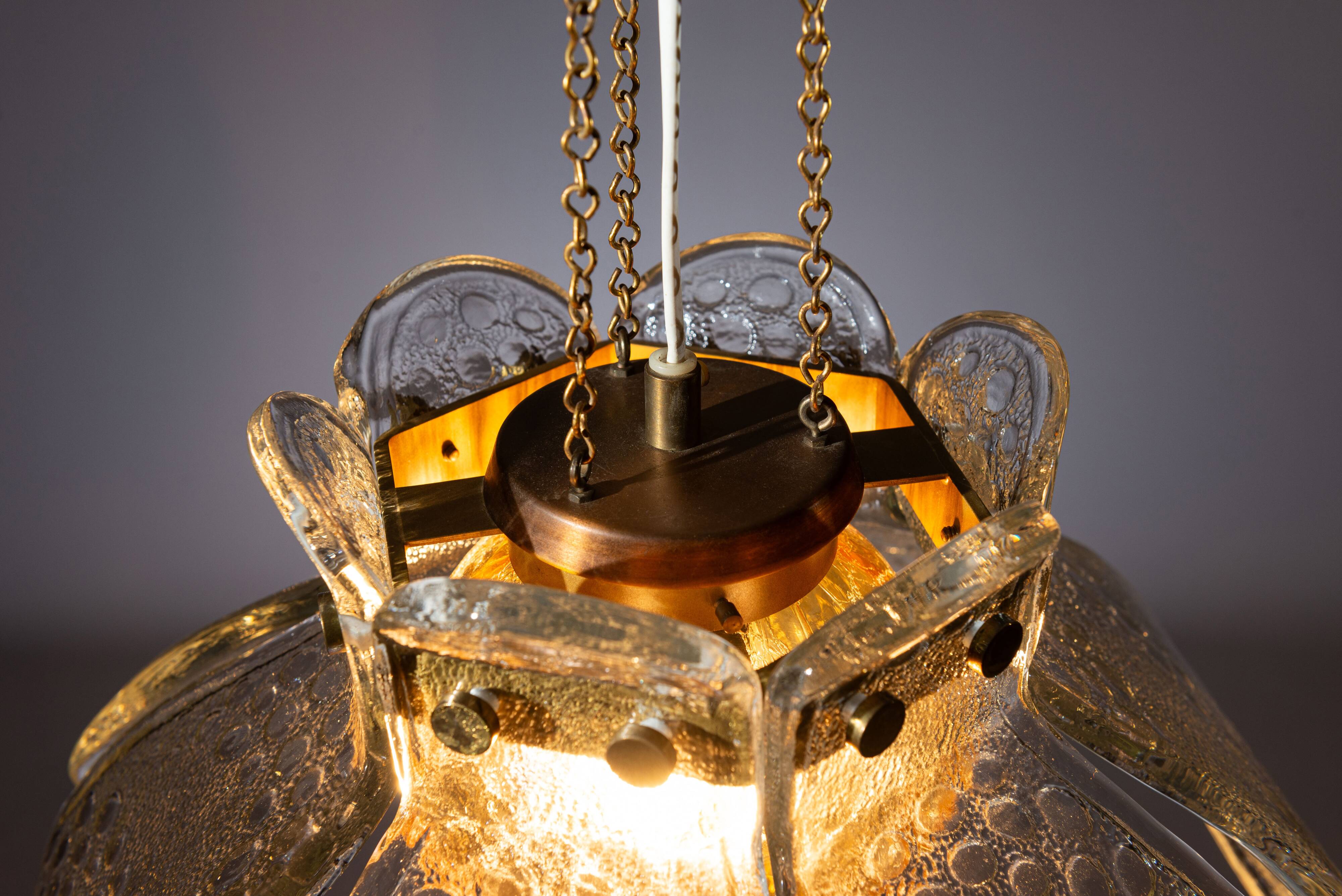 Swedish pendant with glass leaf shades and a center shade of amber coloured