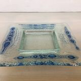 Blue glass paste pocket emptier