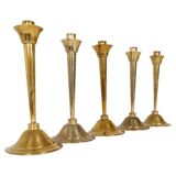 Mid-century set of 5 brass candlesticks by Lars Holmström, Arvika, Sweden.