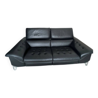 Roche Bobois sofa with removable headrest in black leather.