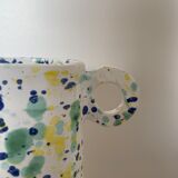 Green blue yellow speckled ceramic vase with abstract wool round handles