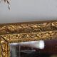 Antique mirror in gilded wood