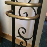 Coat hanger on wrought iron feet