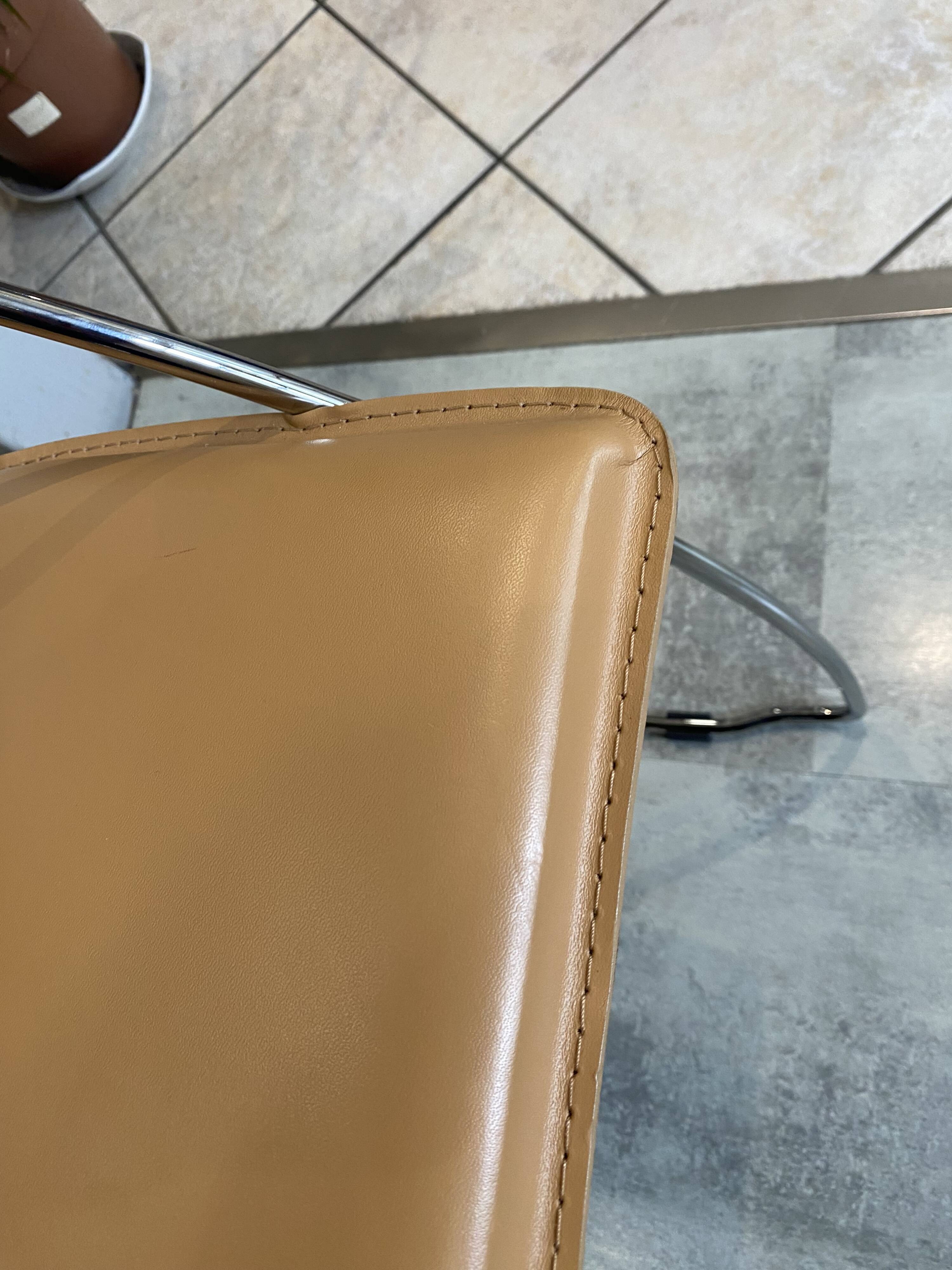 1 Linda armchair chair by Arrben in camel brown leather with a chrome steel frame.