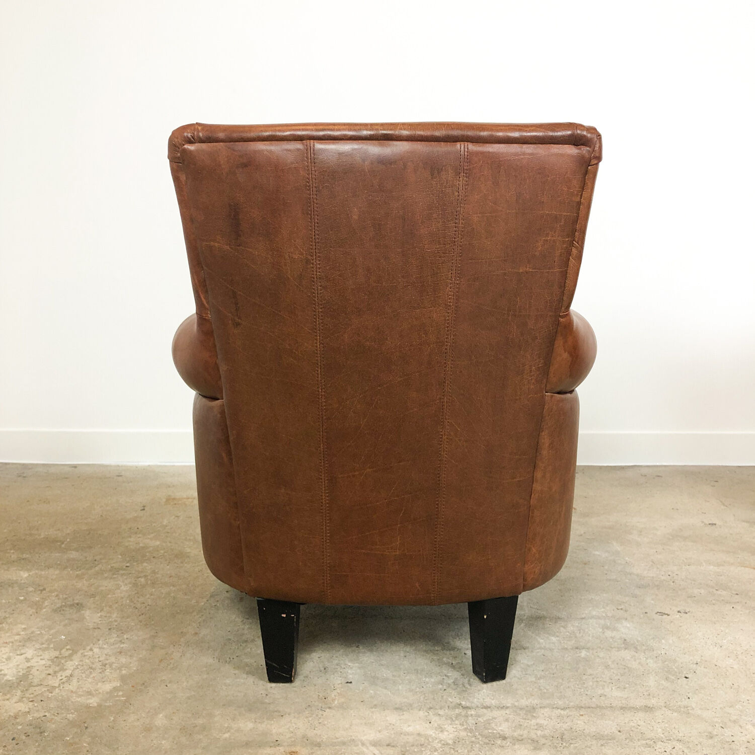 Set of two vintage leather armchairs