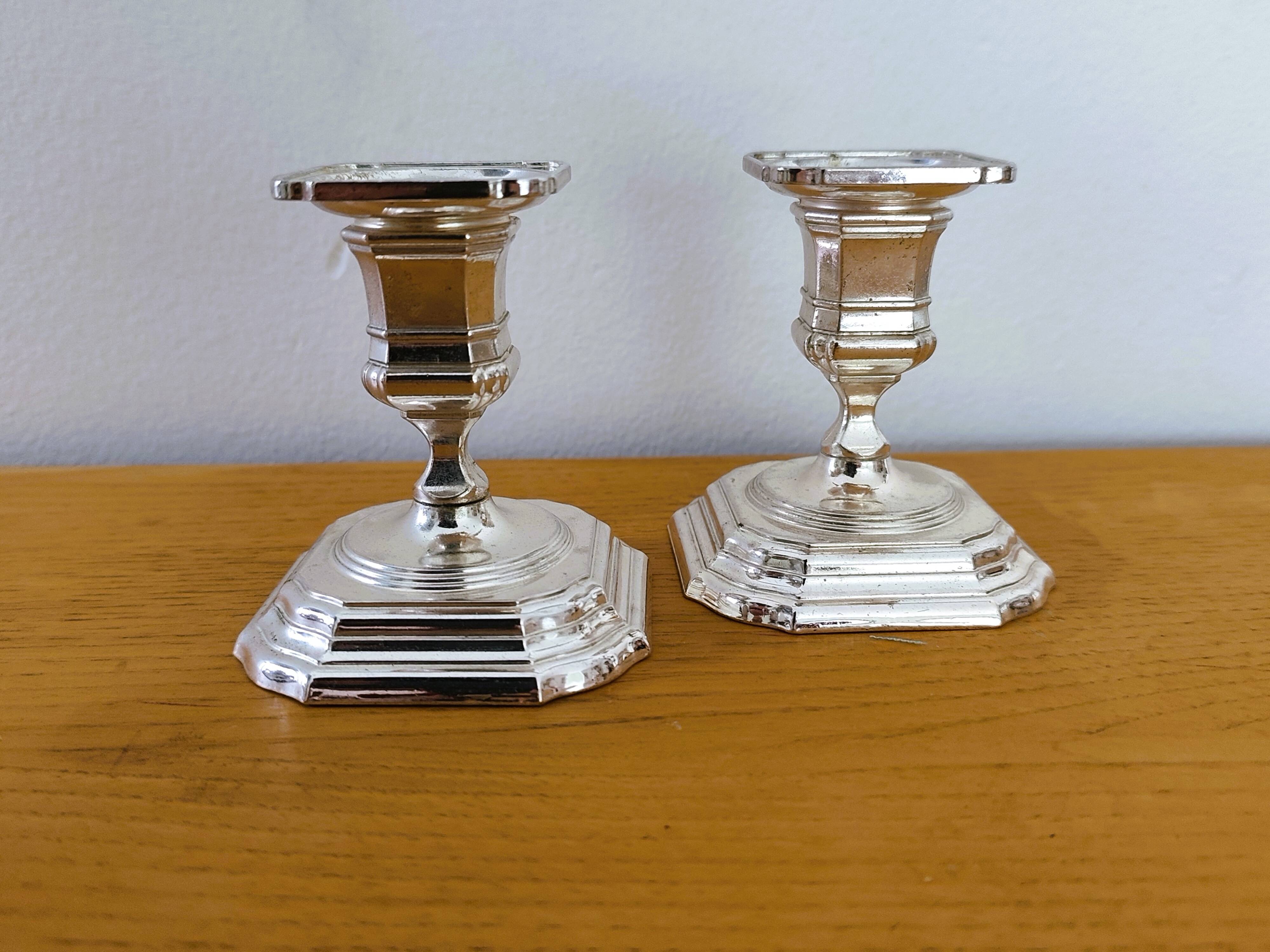 Pair of antique silver-plated candlesticks