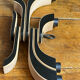 Foldable and deconstructed chandelier, minimalist Swedish design in wood.