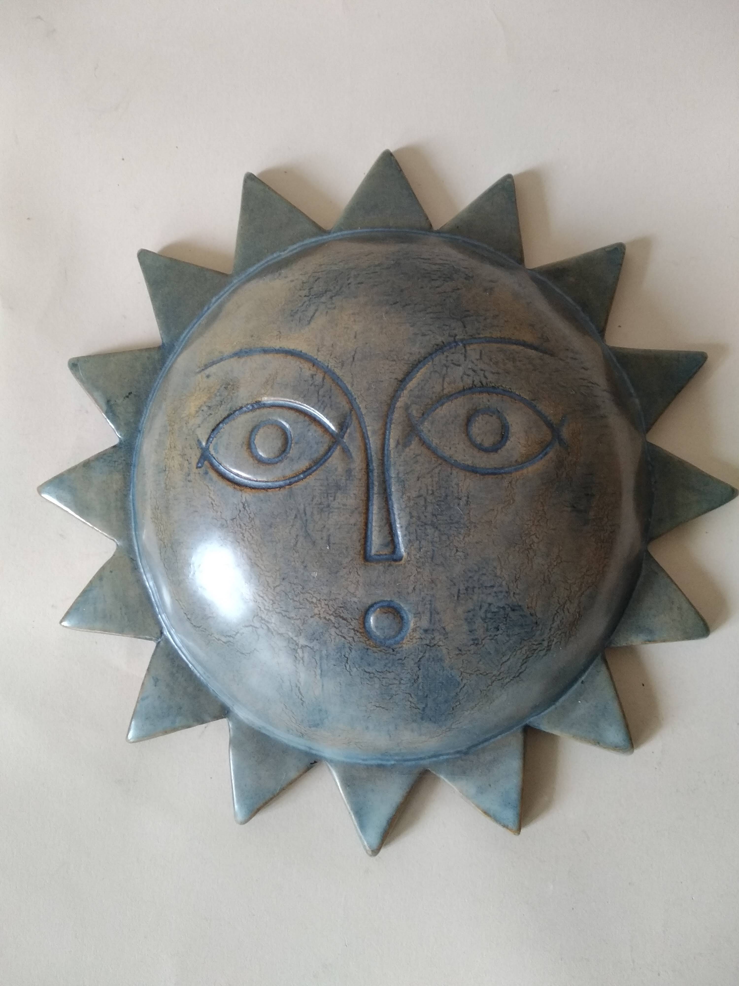 Vintage ceramic sun signed