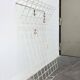 White minimalist string coat rack, modern mid-century, 1960s.
