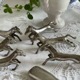 6 silver metal knife holders