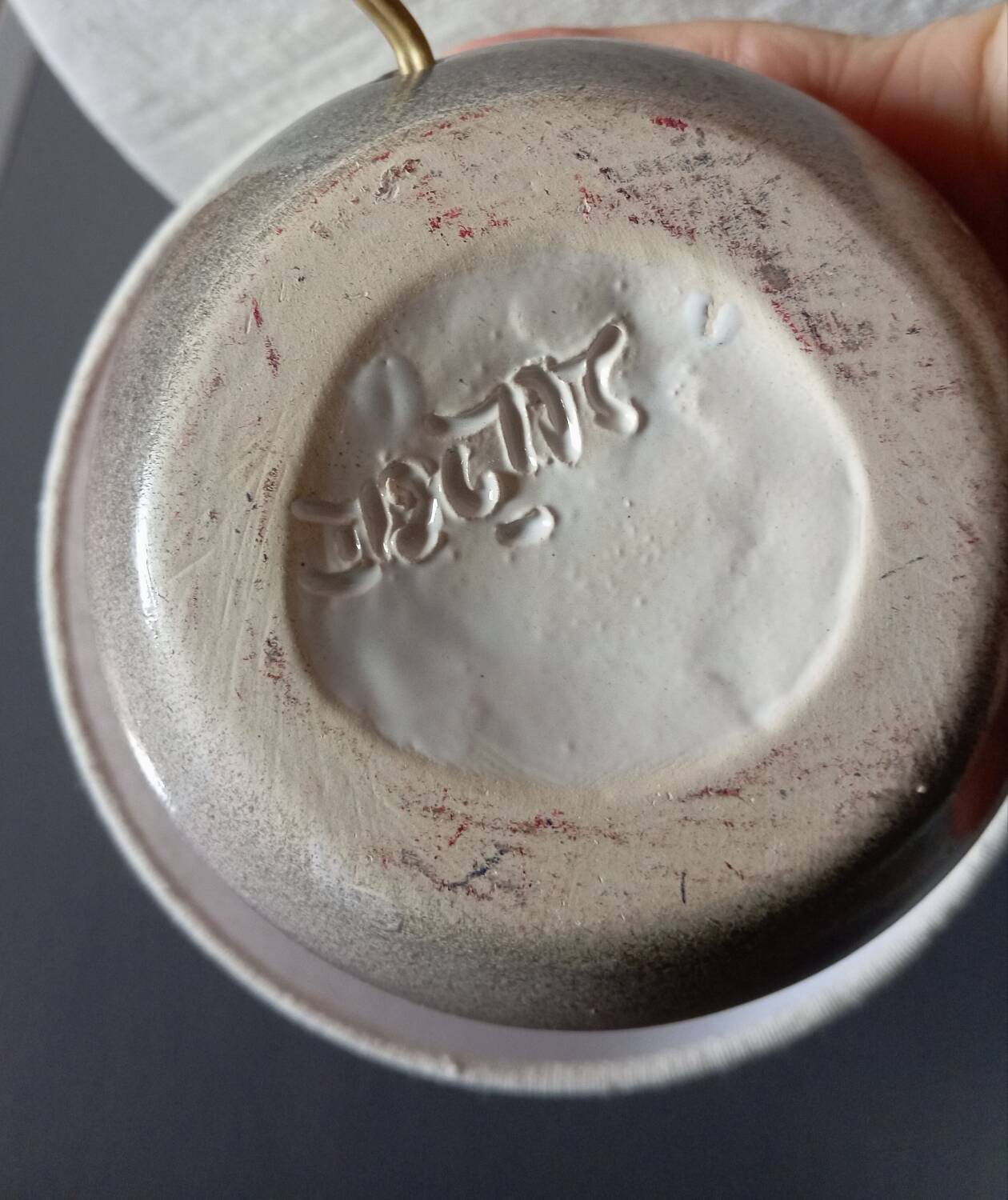 Signed speckled pink ceramic bedside lamp, linen lampshade