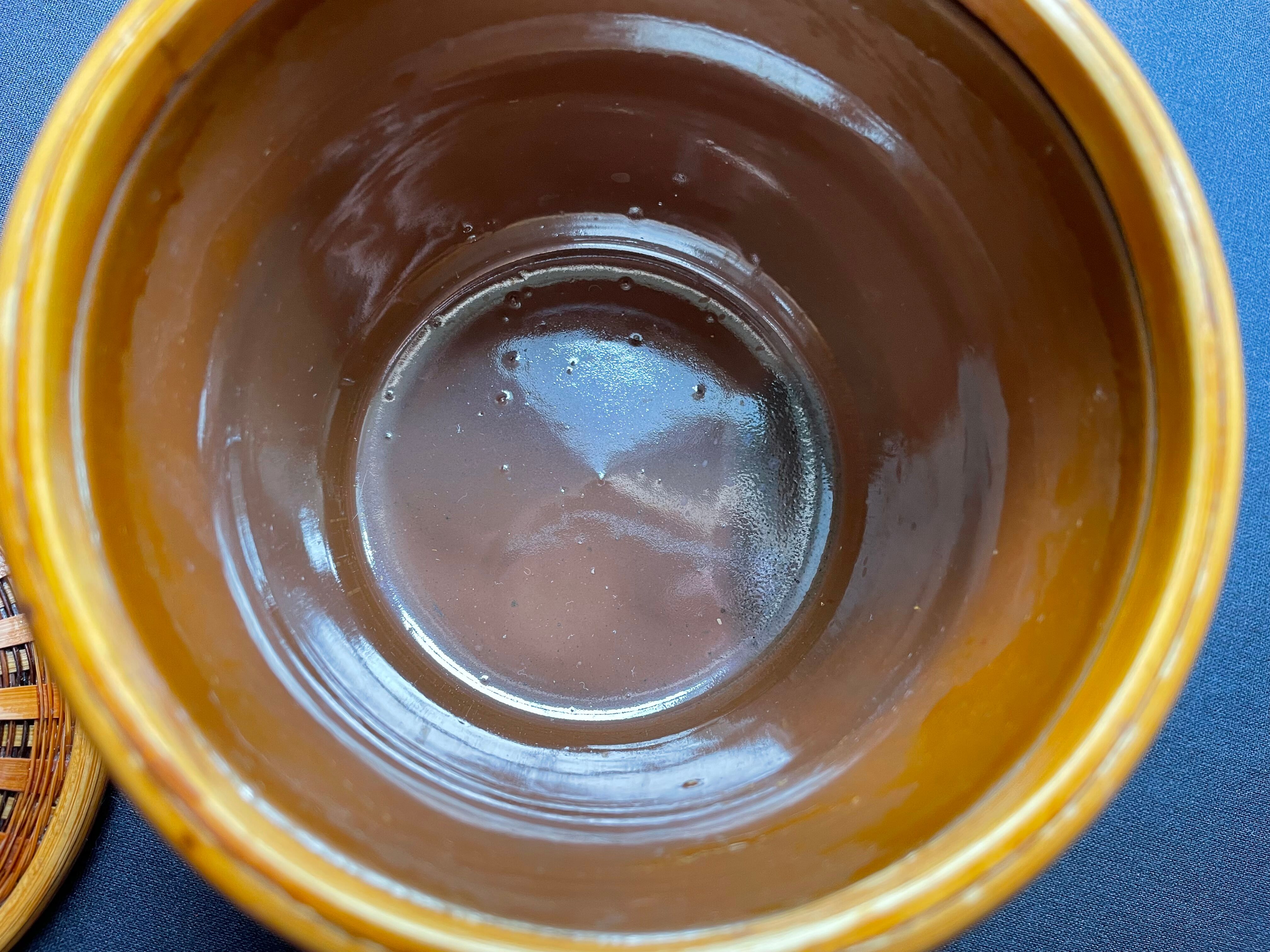 Pot with braided bamboo lid