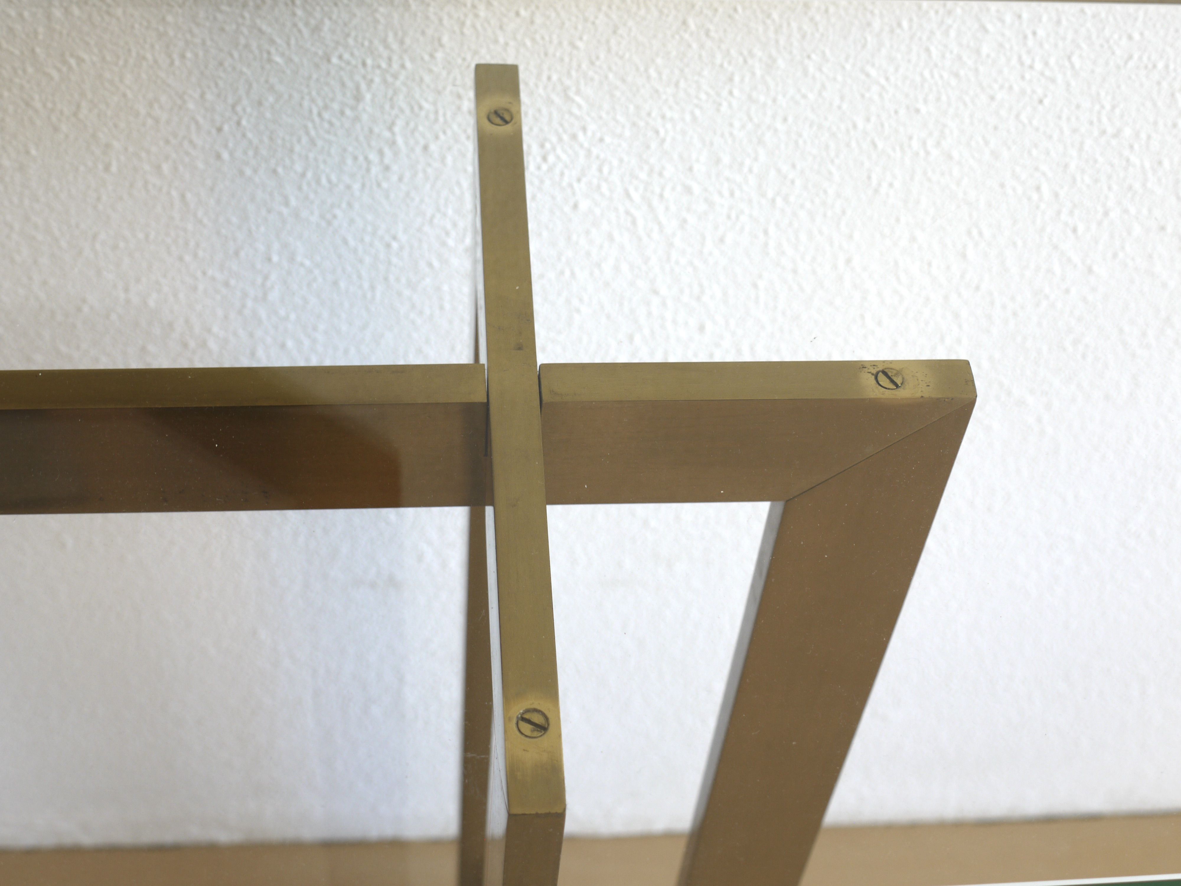 Modernist brass and glass console table & mirror. 1970s