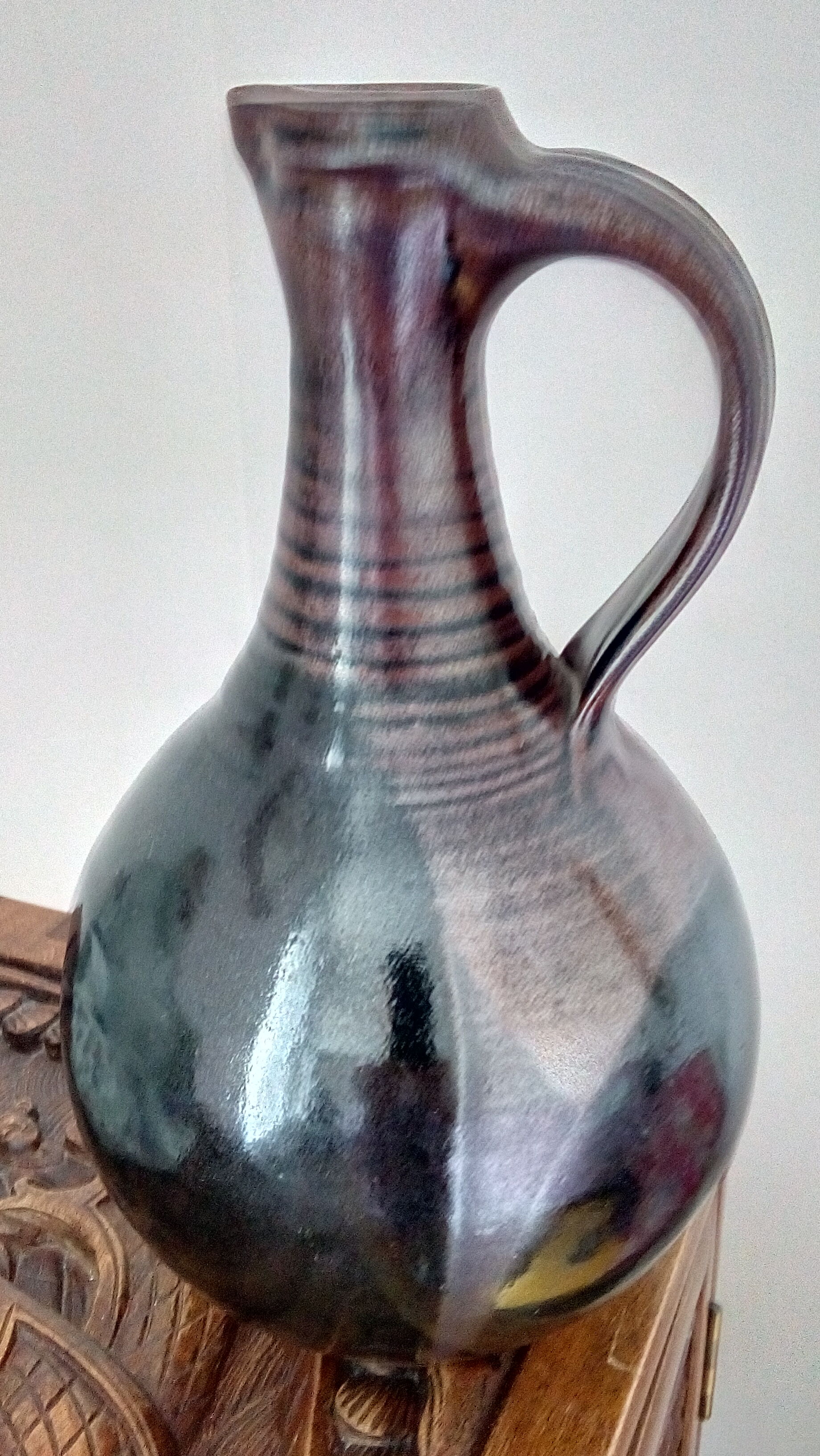 Glazed earthenware carafe