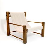 Solid wood armchair with adjustable backrest.