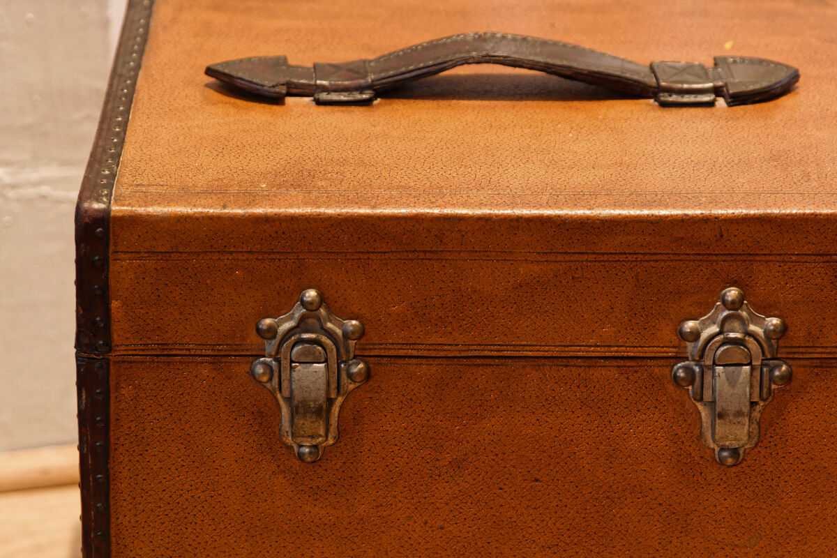 Leather and brass hat malle