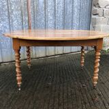 Round table in solid cherry wood, extendable with twisted legs, Louis Philippe style.