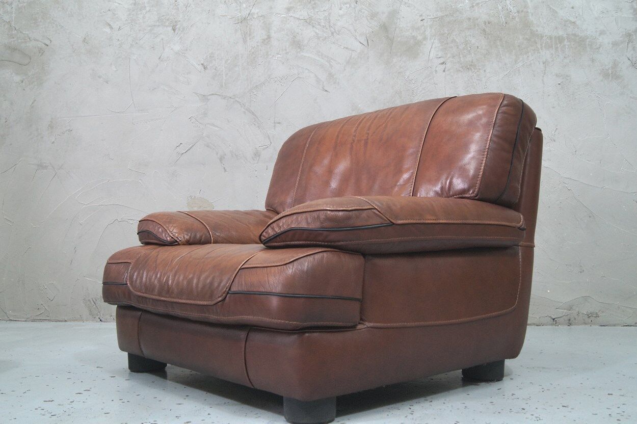 A pair of vintage Italian leather Lounge Chairs, 1970s