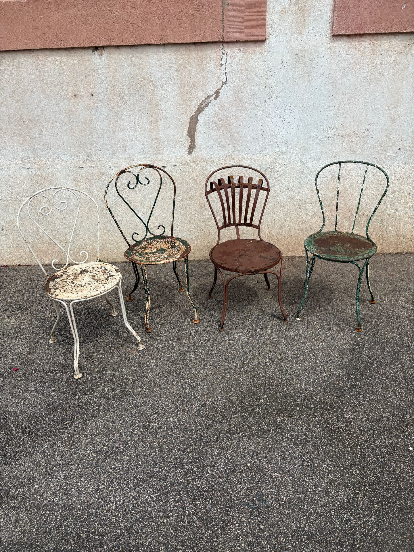 Mélange of vintage garden chairs