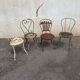Mélange of vintage garden chairs