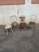 Mélange of vintage garden chairs